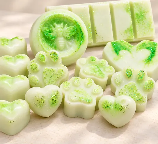 Heart and paw shaped wax melts with green glitter